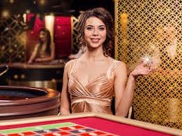 Antarmuka aplikasi mobile 1wins menampilkan menu sportsbook, live dealer, dan slot